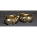 A pair of Victorian silver two handled salts,