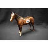 A Beswick ceramic model of a large brown horse