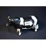 A Beswick model, Fresian dairy cow, Ch Coddington Hilt Bar, gloss finish,20cm long,