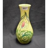 A Moorcroft Arum Lily pattern slender baluster vase,