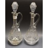 A pair cut glass claret jugs
