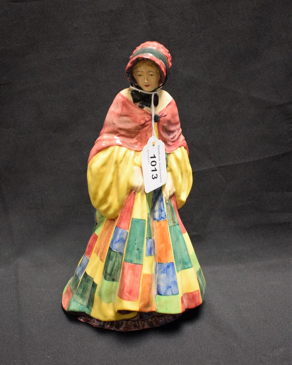 A Royal Doulton figure, The Parson's Daughter, hand decorated in bright colours,