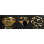 A 9ct gold gentleman's signet ring; two other 9ct rings, 8.