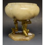 An Art Deco alabaster table centre of compressed ovoid form,