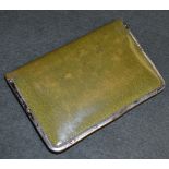 A silver mounted green leather stamp case/wallet