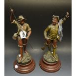 A pair of spelter figures depicting a huntsman and fisherman, French,