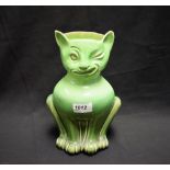 An Art Pottery novelty vase, possibly Bretby or a related factory, modelled as a grotesque cat,