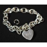 A silver bracelet with heart shaped padlock, Tiffany and Co.