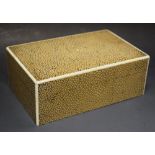 An Art Deco shagreen cigarette box, hinged cover, outlined with faux ivory stringing,