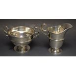 A silver cream jug and twin handled sugar bowl, Birmingham 1927,