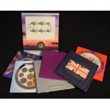 A quantity of modern UK commemorative and specimen coin sets: 1995, 1997,