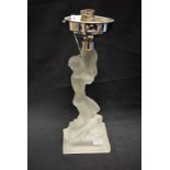 An Art Deco frosted glass figural table lamp, moulded as a scantily clad female, kneeling,