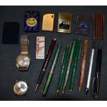 A Zippo lighter; other cigarette lighters; pens; watches;