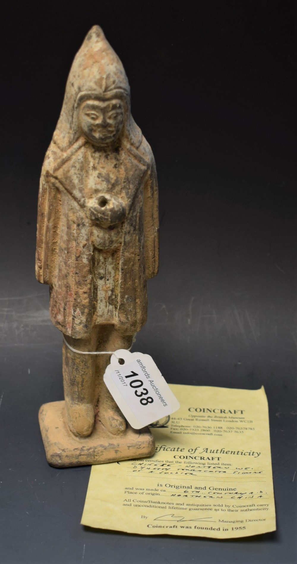 A Chinese terracotta figure of a warrior, 25cm,
