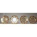 A set of four Royal Crown Derby 1128 pattern plates, 21cm,