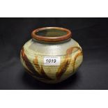 A Studio Pottery Leach type stoneware compressed ovoid vase,