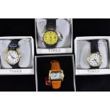 Watches - Timex, a Titanium WR200M wristwatch, yellow dial, luminous baton markers, arrow hands,