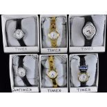 Watches - Timex, a Ladys T20433 gold coloured metal dress watch,