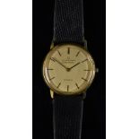 A Universal Geneve Gold Shadow automatic wristwatch, gilt dial, baton markers,