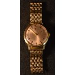 Tissot - A vintage 1960s gentleman's 9ct gold wristwatch, brushed dial, quartered Arabic numerals,