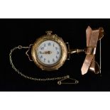 A late 19th century lady's gold pendent/wristwatch with tied ribbon bar brooch, cream dial,