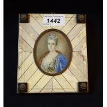 French School, a portrait miniature, of a lady of title, half-length, with flowers at her bossom,