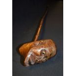 A late 19th century Folk Art pipe, the bowl carved as the head of a bearded gentleman,