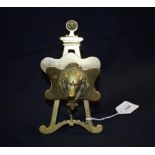 A 19th century brass novelty easel letter rack, cast and applied with the head of a dog, 17cm high,