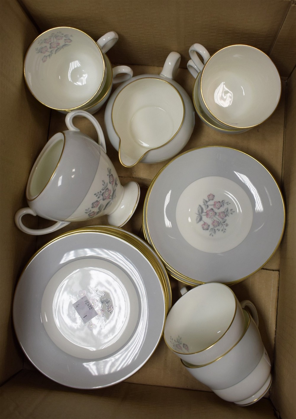 A Wedgwood tea set for six comprising cream jug, sugar bowl, side plates, cups and saucers,