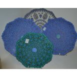 Three graduated Persian enamelled plates, decorated in the typical manner in blue and turquoise,