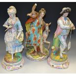 A pair of German figures, of a Bagpiper and companions, coloured in pastel tones, 34cm high, c.