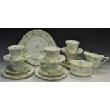 A Royal Doulton Art Deco tea service, for six, angular green hands,