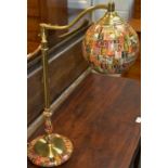 Interior Design - a bespoke brass domed lamp covered in lacquered stamps