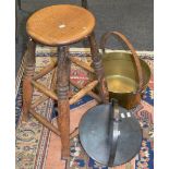 A 19th century farmhouse elm stool; a Victorian brass jam pan;