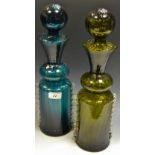 A 20th century turquoise glass decanter, with oversize globular stopper,