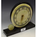 An Art Deco onyx and noir marble mantel clock, c.