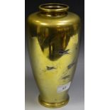 A Japanese bronzed vase, in relief with Storks in flight, 25cm high,