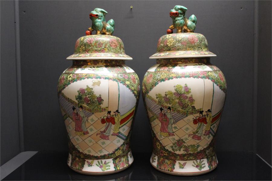 A Pair of 20th century Chinese ovoid jars with, dimensions are approximately 64 cm high by 32 cm