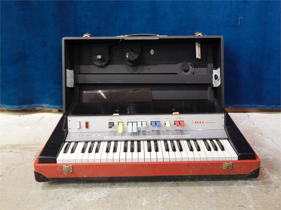 1960`s /1970`s electric organ Elka Panther 2100 or Capri Junior - - (No leads) with suitcase stand.