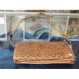 Snakeskin handbag in poor condition.