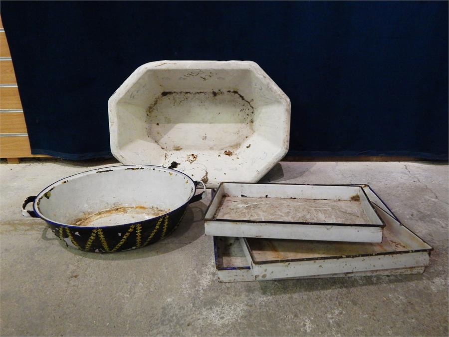 A selection of white enamel trays