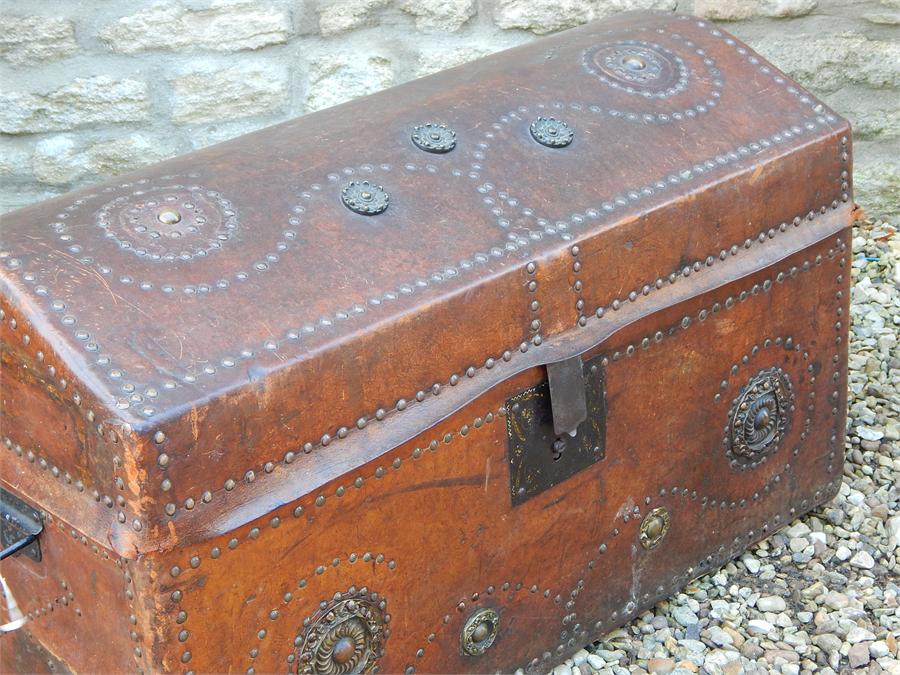 Leather clad brass studded dometop trunk. - Image 4 of 8