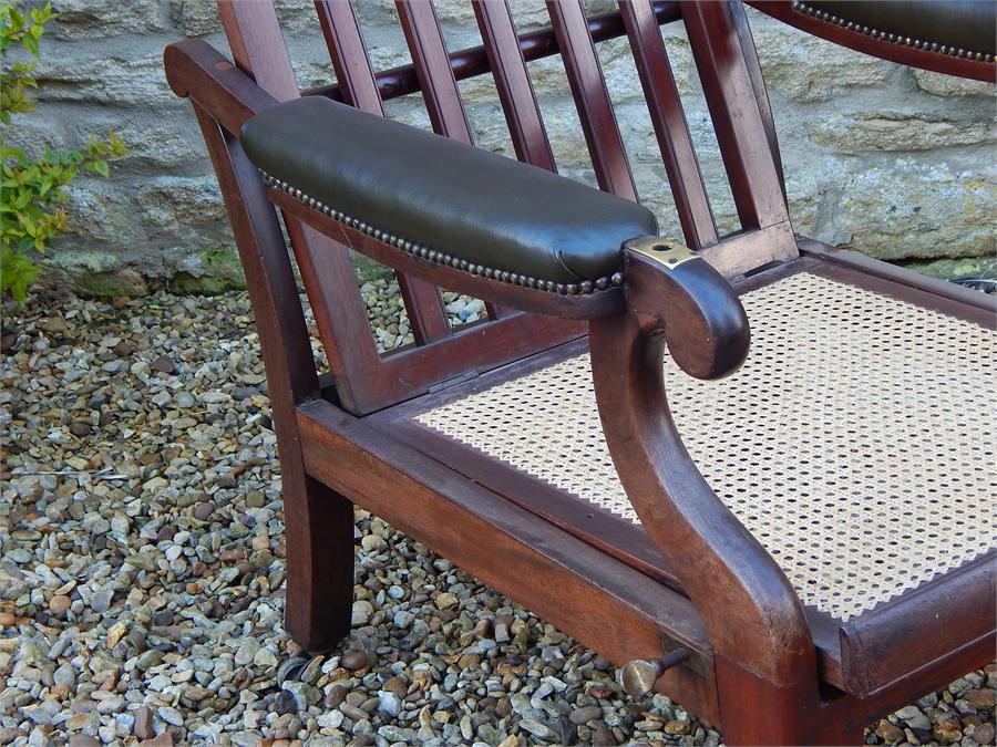 A William iV Metamorphic Adjustable Reclining Mahogany Bergere Library Armchair, with pull out leg - Image 4 of 11