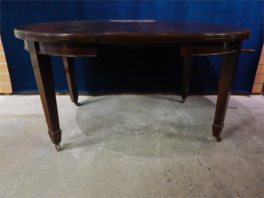 Late 19th Century Mahogany, round and oval extending wind-out table and 1 leaf. 108cm by 150cm ( - Image 2 of 3