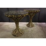 A pair of driftwood round glass top display tables. glass tops not attached.