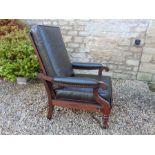 A William iV Metamorphic Adjustable Reclining Mahogany Bergere Library Armchair, with pull out leg