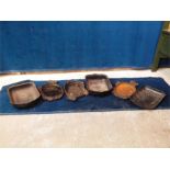 Set of ornate vintage hot plates, irons and cooking trays; 7 items in all.