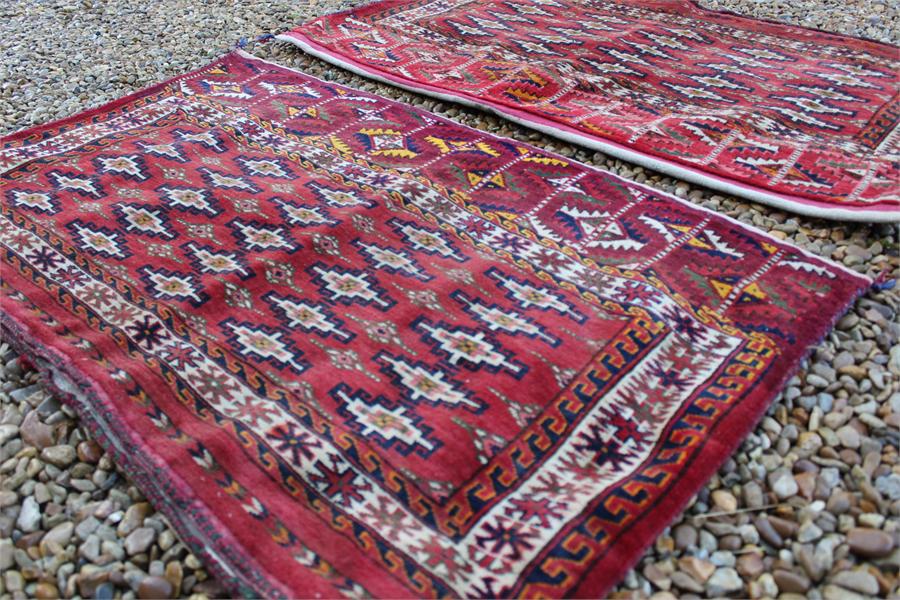 A pair of fine quality Mid 19th century turkoman yamut, very fine weave torbas;in rich red and - Image 8 of 14