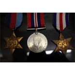 WW2 medals group, George IV star 1939 - 1945, a France and Germany Star, and a long service medal.