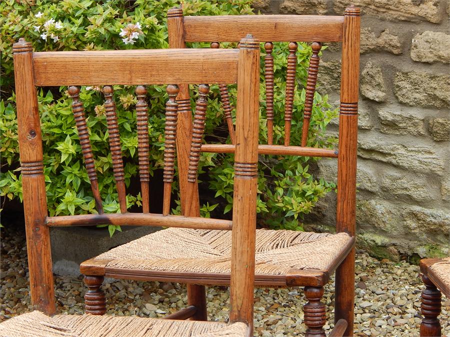 A Set of Four Matching Elm Country Kitchen Rush Seated Side Chairs, turned spindle Backs in a fan - Image 5 of 12